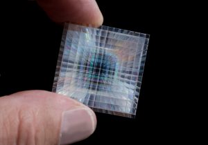 Hand holding tiny high-precision imaging array